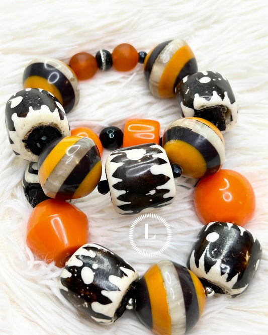 Set Of 2: XL Black and White Batik Bone With Orange And Striped Resin Accents