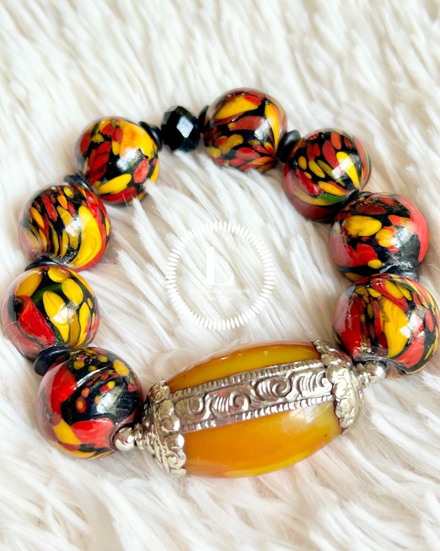 Yellow/Red/Black Spotted Glass With XL Amber/Orange Focal