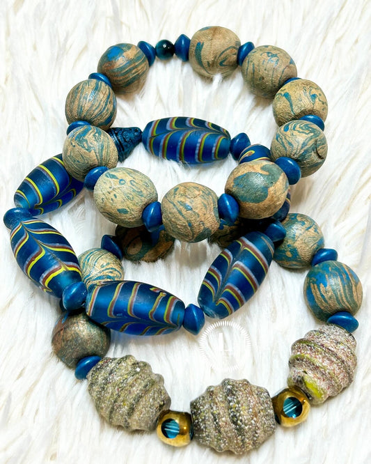 Engraved taupe-colored Sand Grain Beads,Teal Blue Painted Wood With Electric Blue Feathered Motif Accents