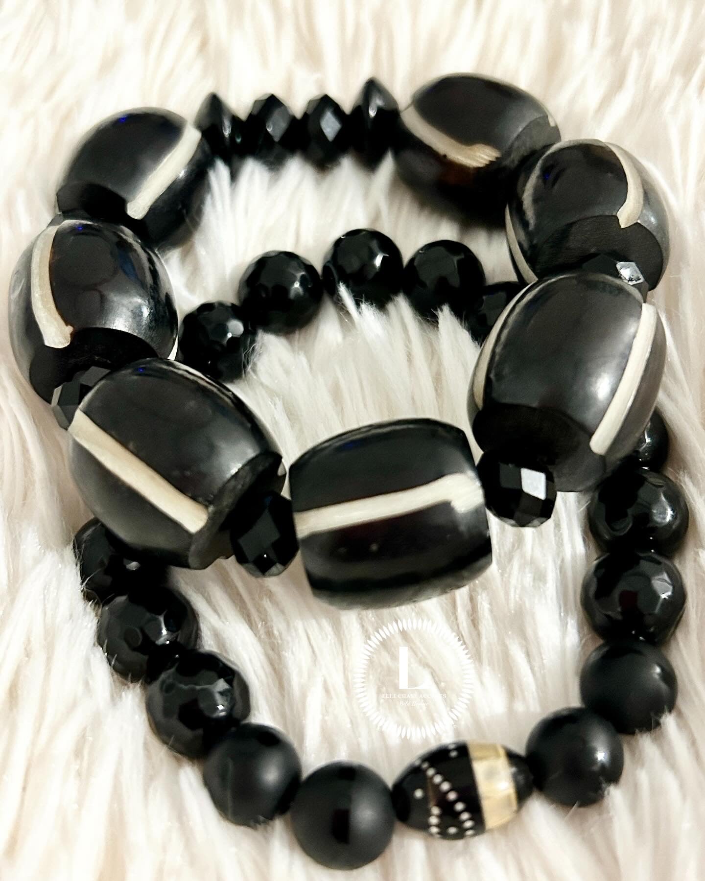 Black/White Carved Striped Resin With Black Onyx Accents